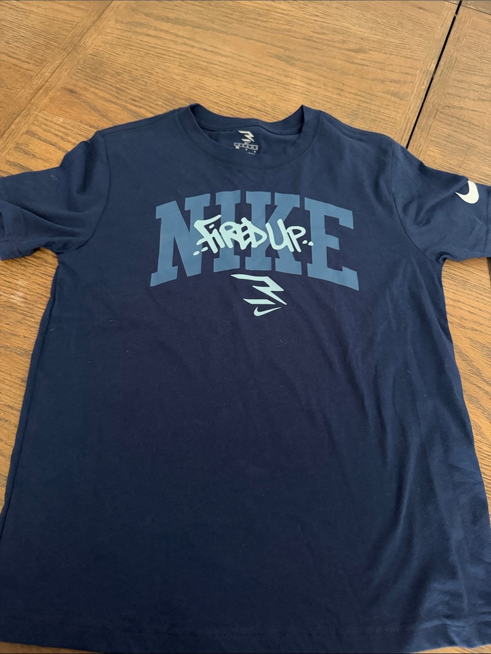 Youth Medium Nike Navy Blue Tee with Light Blue Graphic
